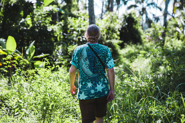 man hiking with graphic t-shirt