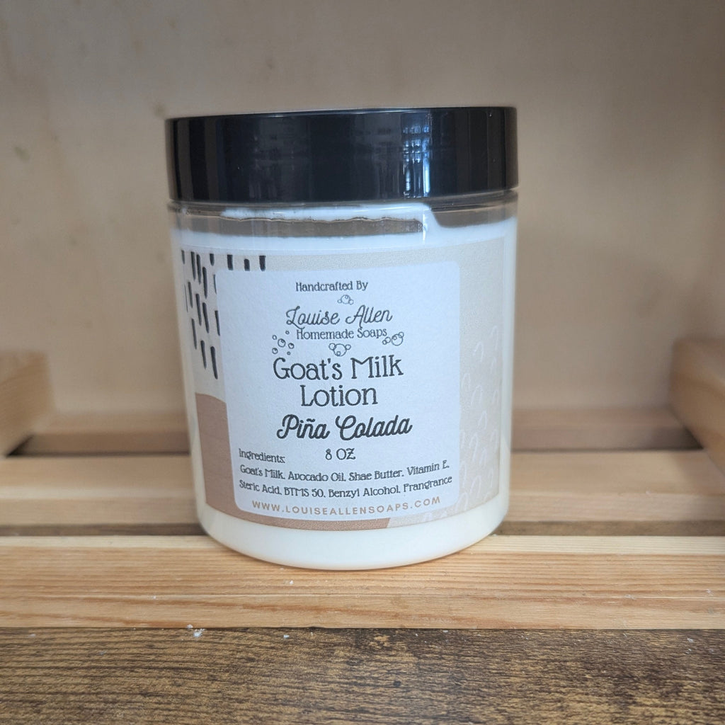 Jar of goats' milk lotion on a wooden surface