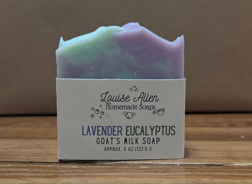 Bar of lavender eucalyptus soap with a label on a wooden surface