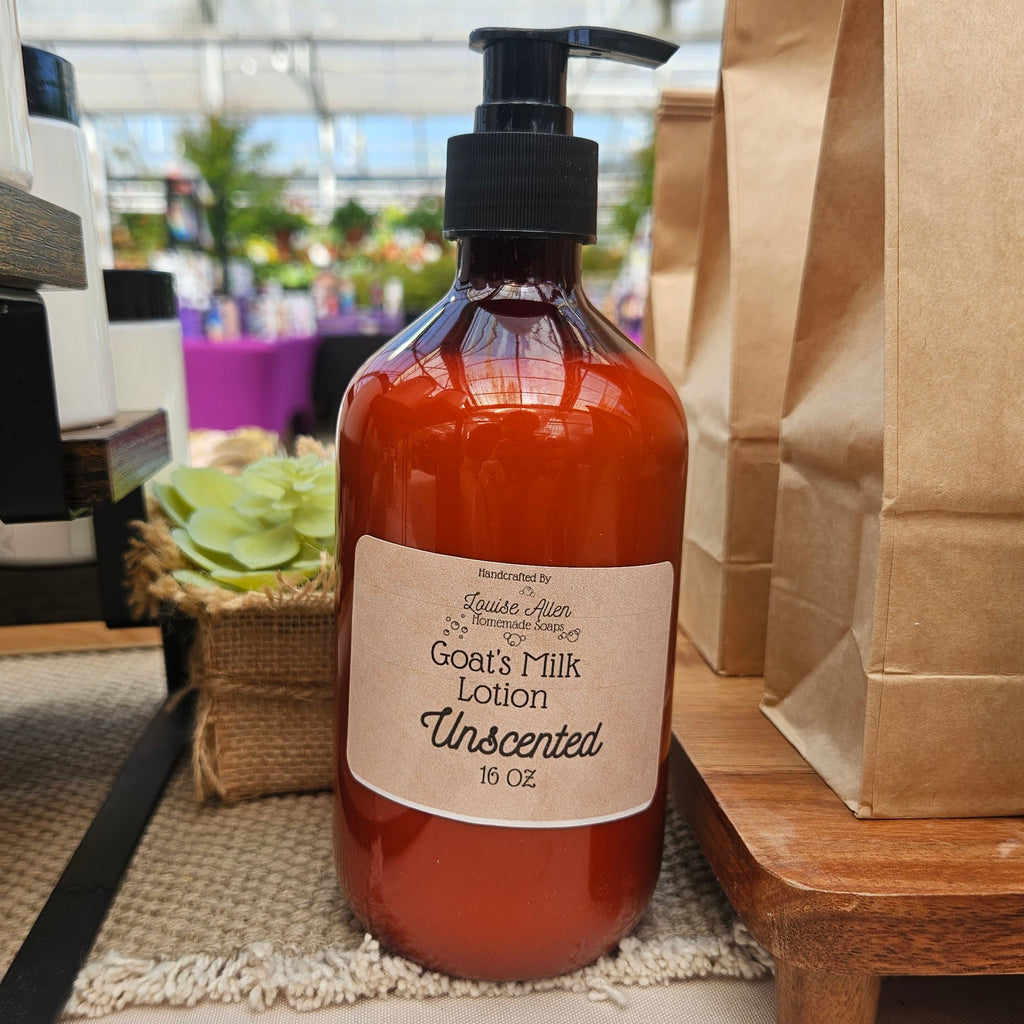 Bottle of unscented goat's milk lotion on a table with a blurred background