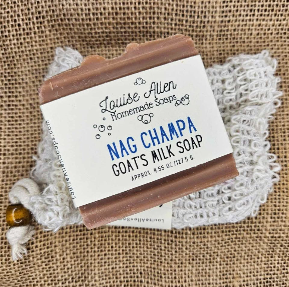 Bar of soap with a label on a textured fabric background